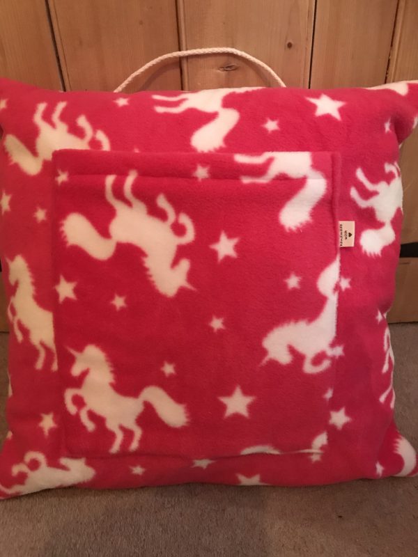 Pink unicorn reader cushion